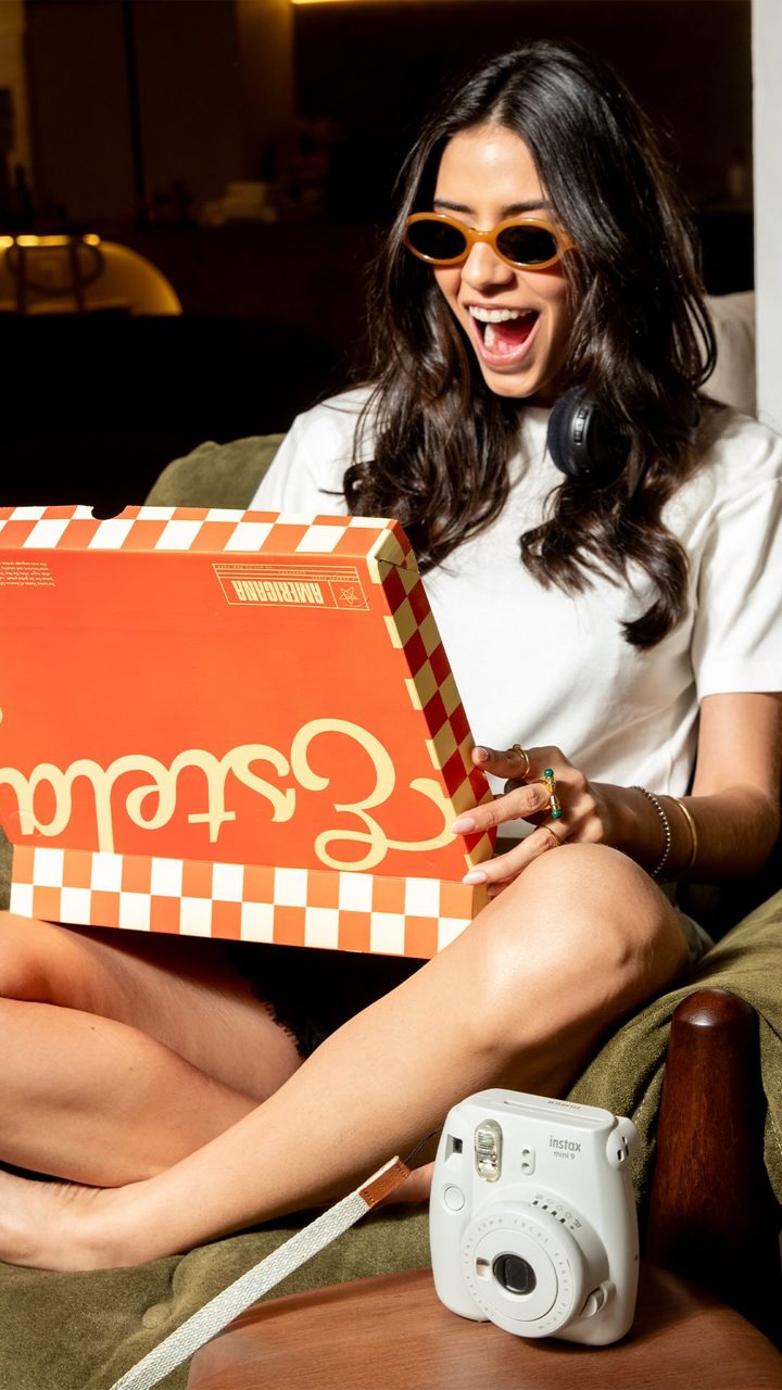 Capa do Reel: Estela, pizza em close com frase em italiano
